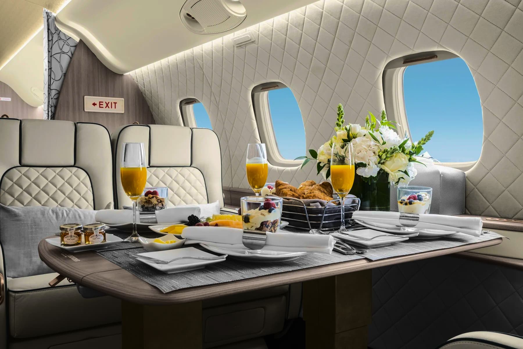 A private jet cabin behind the footer
